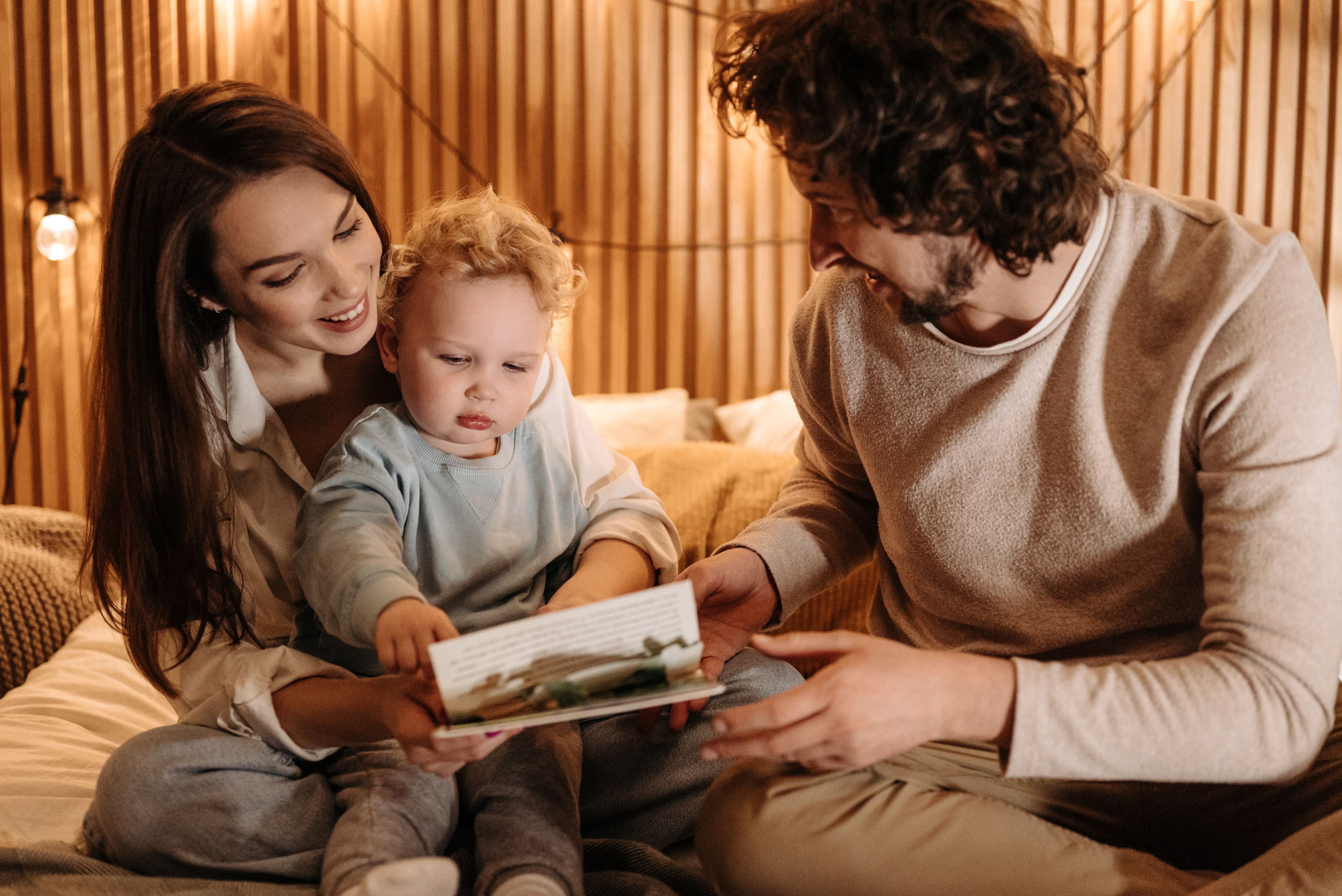 Father and daughter reading together
